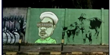 Mural mirip Tenaga Ahli Kantor Staf Presiden (KSP) Ali Mochtar Ngabalin yang viral di dunia maya.