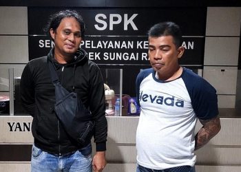 Budi Tato (kaos putih) diamankan polisi. Foto: Ist