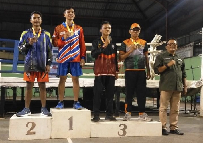 Atlet Muaythai Kapuas Hulu Natalis Hendjuk berhasil meraih medali emas di Porprov Kalbar