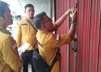 Foto--Ruko di Pasar Entikong yang disegel Disperindagkop Sanggau pada 31 Januari 2023-ist