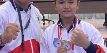 Yordan Gary didampingi pelatihnya Mustawadin yang bakal mengikuti O2SN tingkat nasional